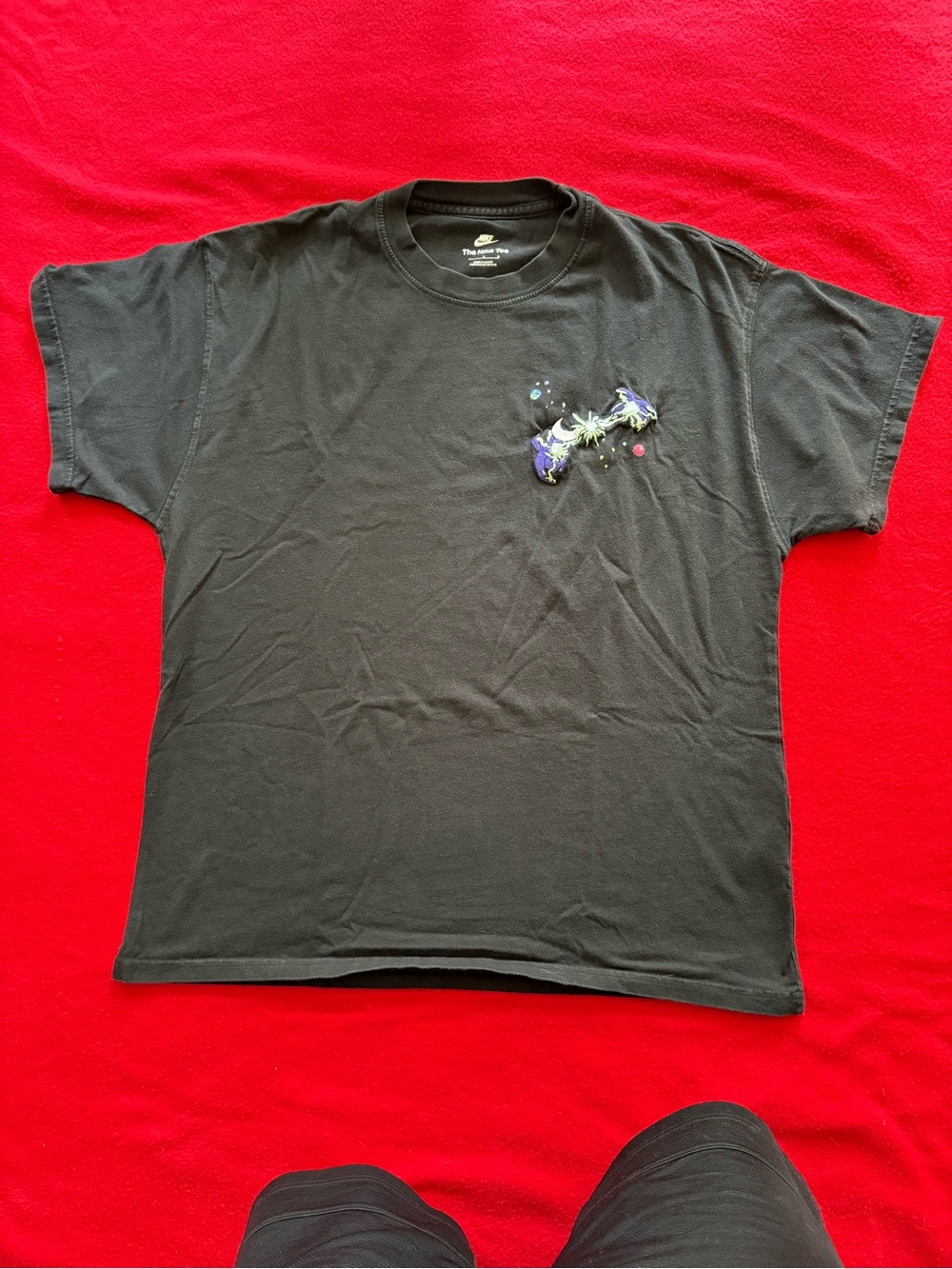 Black Nike Graphic Crewneck T-Shirt with Subtle Embroidered Accent, Back Emblem